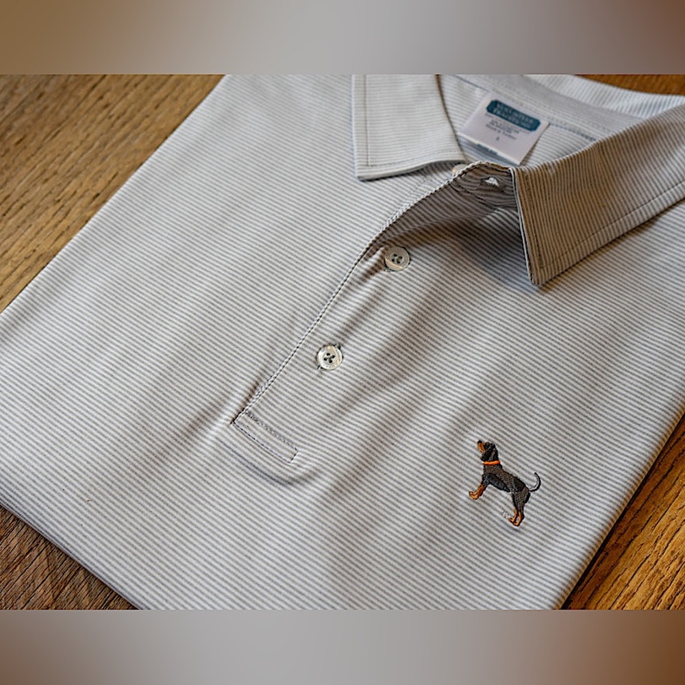 Volunteer Traditions blue tick hound polo dry fit
